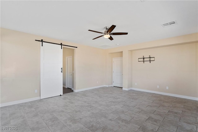 9240 Northfield Park Ct, Las Vegas, NV 89148 - empty room featuring ceiling fan and a barn door