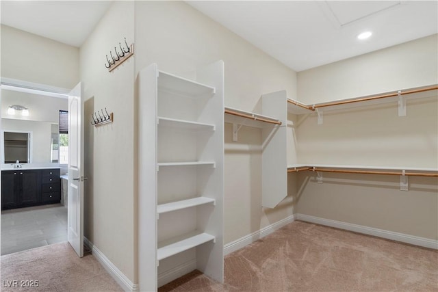 9240 Northfield Park Ct, Las Vegas, NV 89148 - walk in closet with light carpet and attic access