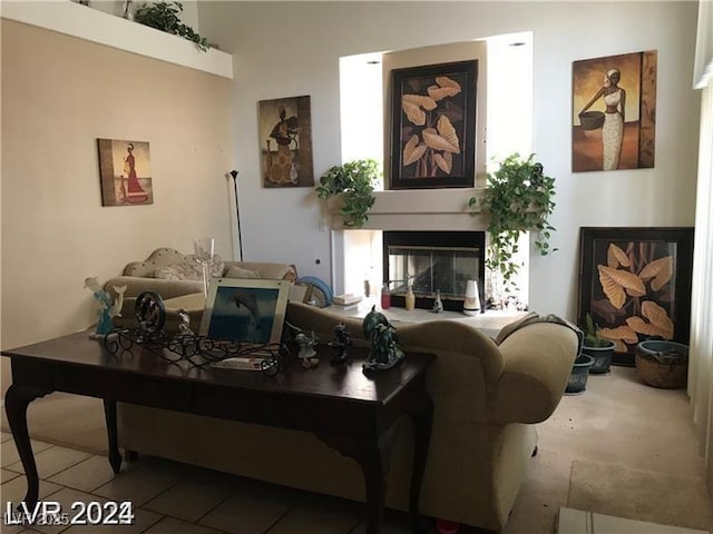 8769 Country View Ave, Las Vegas, NV 89129 - tiled living area with a multi sided fireplace