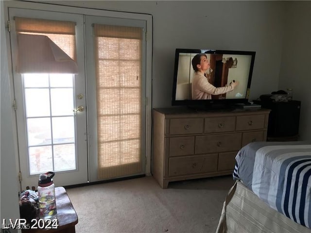 8769 Country View Ave, Las Vegas, NV 89129 - bedroom featuring light carpet