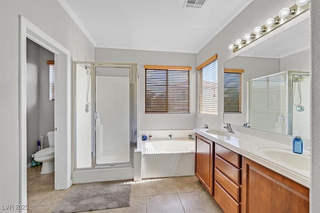10601 Lessona St, Las Vegas, NV 89141 - bathroom with a shower stall, a bath, double vanity, tile patterned floors, and crown molding