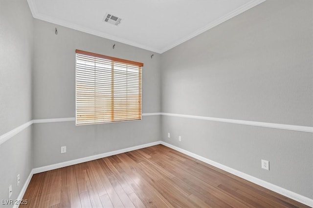 10601 Lessona St, Las Vegas, NV 89141 - empty room with wood finished floors and ornamental molding
