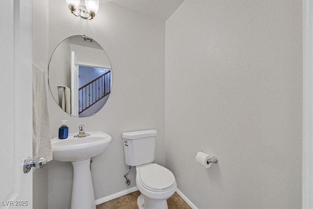 10601 Lessona St, Las Vegas, NV 89141 - half bathroom featuring tile patterned floors and toilet
