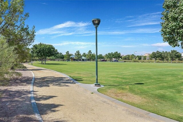 10601 Lessona St, Las Vegas, NV 89141 - view of community with a lawn