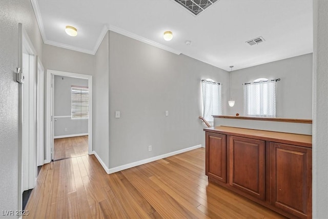 10601 Lessona St, Las Vegas, NV 89141 - corridor with light wood-style flooring and crown molding
