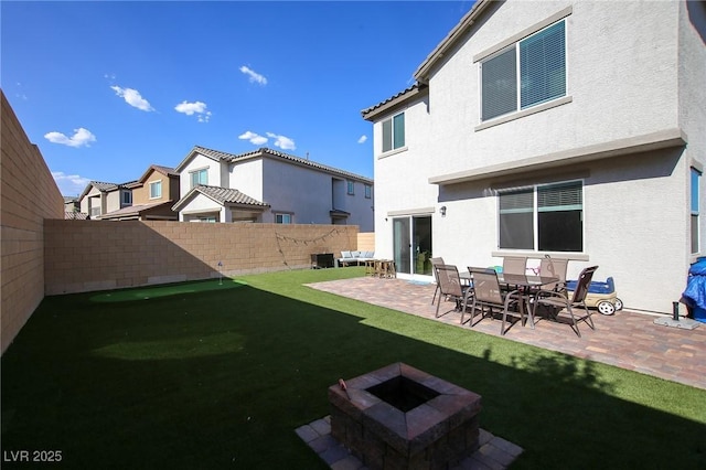 7037 Tilligerry St, North Las Vegas, NV 89084 - view of yard with an outdoor fire pit, a patio, and a residential view