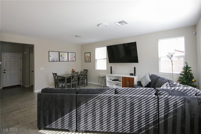 7037 Tilligerry St, North Las Vegas, NV 89084 - living area with wood finished floors and baseboards