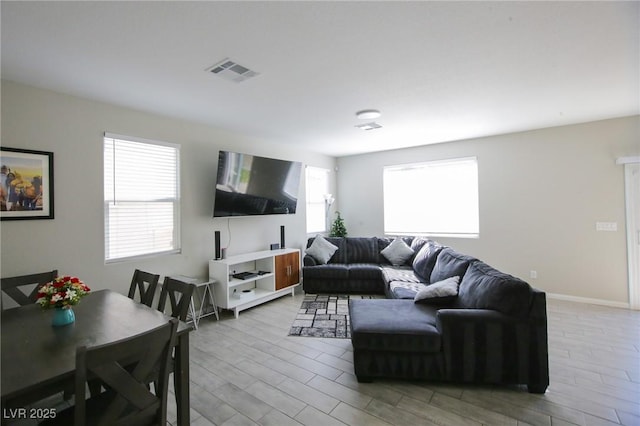 7037 Tilligerry St, North Las Vegas, NV 89084 - living room with light wood finished floors