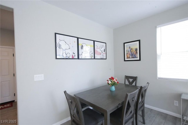 7037 Tilligerry St, North Las Vegas, NV 89084 - dining space featuring plenty of natural light and wood finished floors