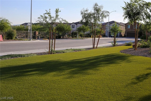 7037 Tilligerry St, North Las Vegas, NV 89084 - view of grassy yard with a residential view