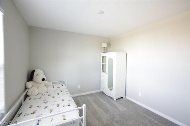 7037 Tilligerry St, North Las Vegas, NV 89084 - bedroom with light carpet and baseboards