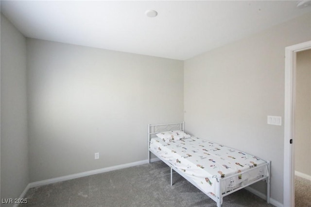 7037 Tilligerry St, North Las Vegas, NV 89084 - carpeted bedroom with baseboards