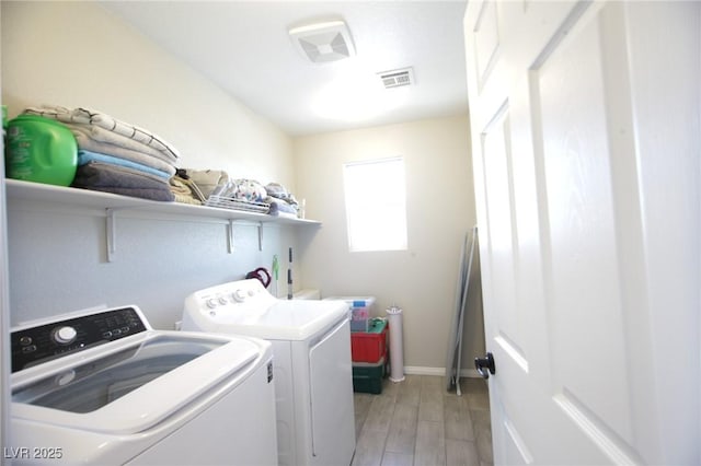 7037 Tilligerry St, North Las Vegas, NV 89084 - laundry room featuring independent washer and dryer and light wood finished floors
