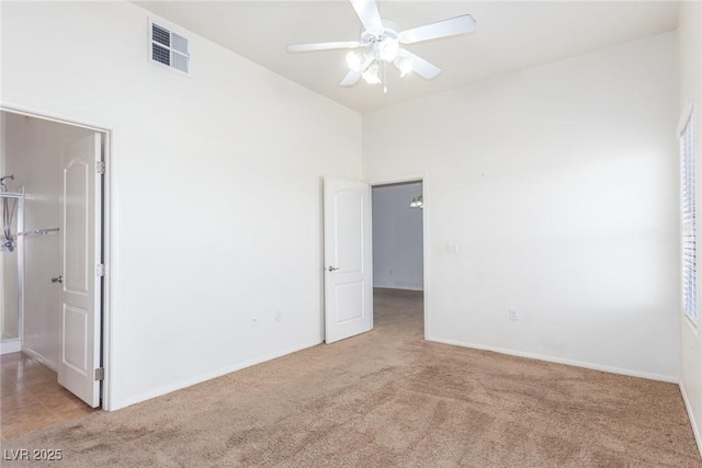 8805 Jeffreys St Unit 1003, Las Vegas, NV 89123 - unfurnished bedroom with light colored carpet and lofted ceiling