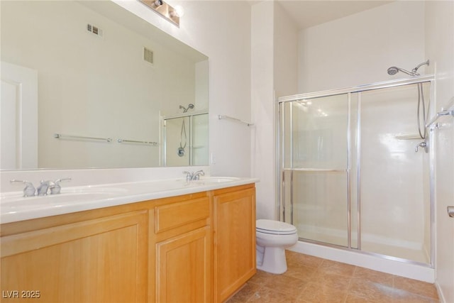8805 Jeffreys St Unit 1003, Las Vegas, NV 89123 - bathroom with double vanity and a shower with shower door