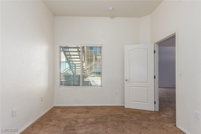 8805 Jeffreys St Unit 1003, Las Vegas, NV 89123 - carpeted spare room featuring baseboards