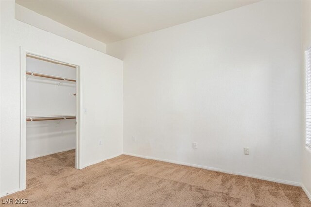 8805 Jeffreys St Unit 1003, Las Vegas, NV 89123 - unfurnished bedroom featuring carpet flooring, a spacious closet, and a closet