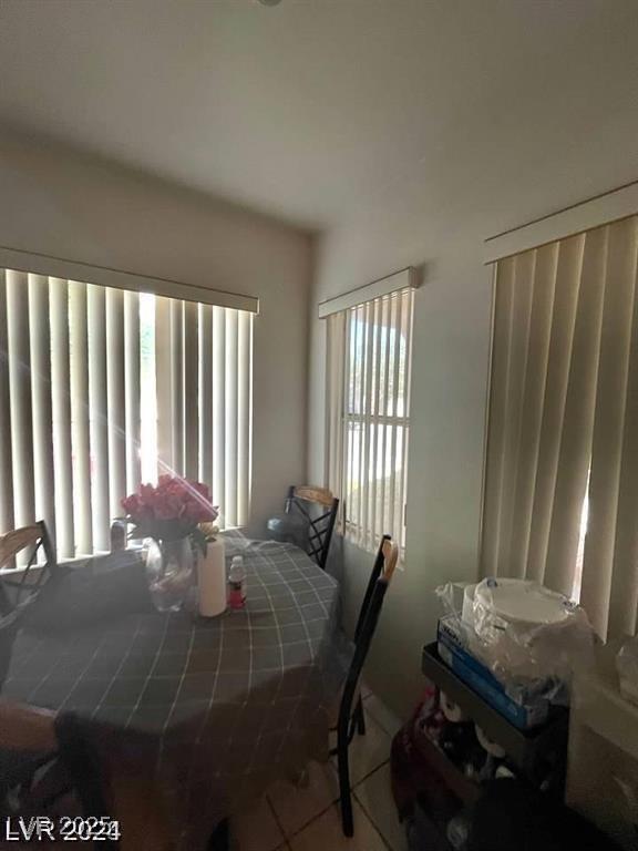 9801 Bradford Summit St, Las Vegas, NV 89183 - dining room featuring tile patterned flooring