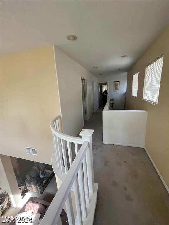 9801 Bradford Summit St, Las Vegas, NV 89183 - corridor with an upstairs landing, carpet floors, and recessed lighting