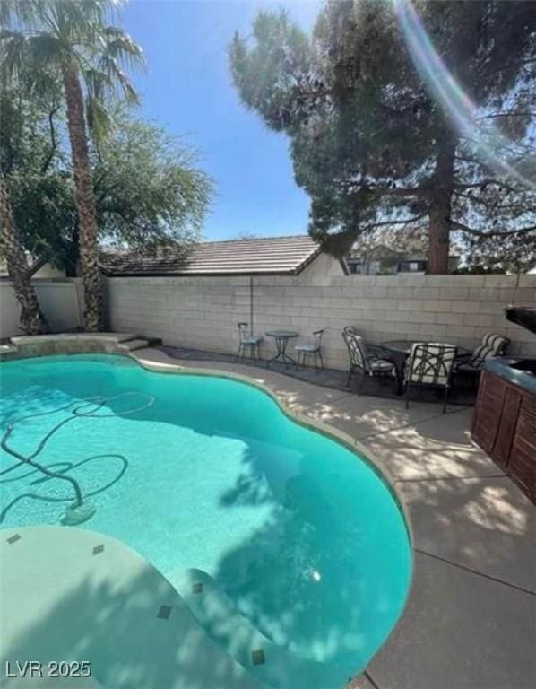 9801 Bradford Summit St, Las Vegas, NV 89183 - view of swimming pool featuring a fenced backyard and a patio