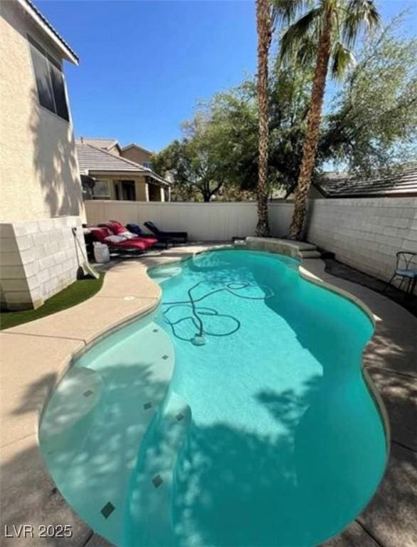 9801 Bradford Summit St, Las Vegas, NV 89183 - view of swimming pool with a fenced backyard