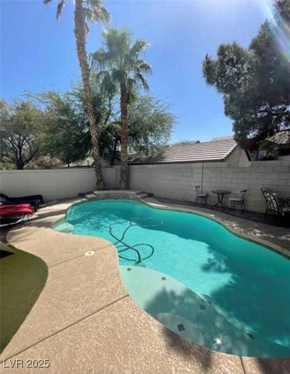 9801 Bradford Summit St, Las Vegas, NV 89183 - view of pool featuring a fenced backyard and a patio