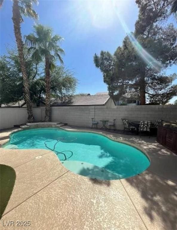 9801 Bradford Summit St, Las Vegas, NV 89183 - view of pool with a patio and a fenced backyard