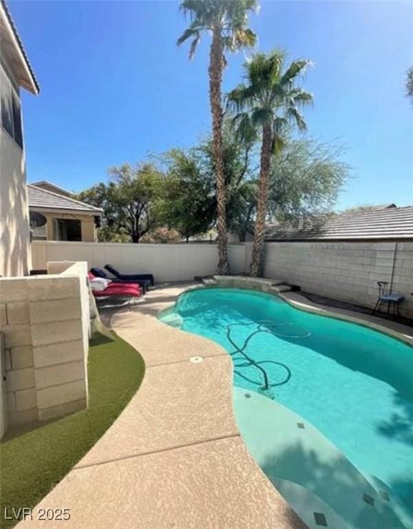 9801 Bradford Summit St, Las Vegas, NV 89183 - view of swimming pool with a fenced backyard and a patio