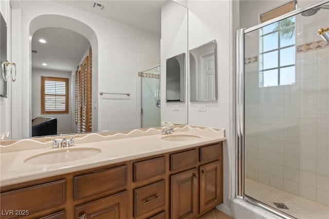 11680 Evergreen Creek Ln, Las Vegas, NV 89135 - bathroom featuring a shower stall and double vanity