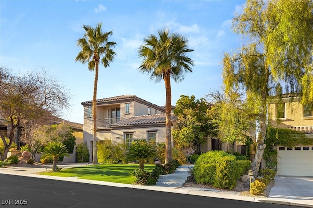 11680 Evergreen Creek Ln, Las Vegas, NV 89135 - mediterranean / spanish home with a tile roof, stucco siding, a garage, and a balcony