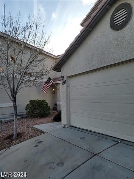 9617 Pine River Ln, Las Vegas, NV 89123 - garage with driveway