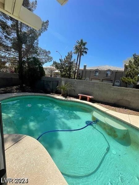 9617 Pine River Ln, Las Vegas, NV 89123 - view of pool with a fenced backyard