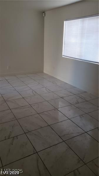 9617 Pine River Ln, Las Vegas, NV 89123 - spare room with light tile patterned floors