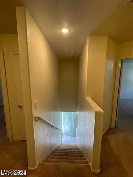 9617 Pine River Ln, Las Vegas, NV 89123 - stairway with carpet