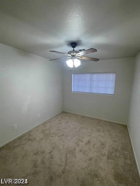 9617 Pine River Ln, Las Vegas, NV 89123 - carpeted empty room featuring ceiling fan and baseboards