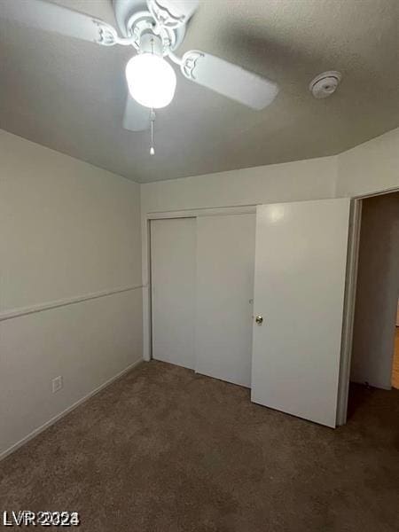 9617 Pine River Ln, Las Vegas, NV 89123 - unfurnished bedroom featuring carpet floors, a closet, and a ceiling fan
