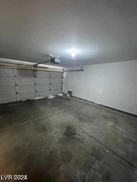 9617 Pine River Ln, Las Vegas, NV 89123 - garage with a garage door opener