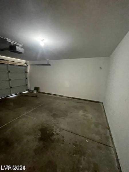 9617 Pine River Ln, Las Vegas, NV 89123 - garage featuring a garage door opener