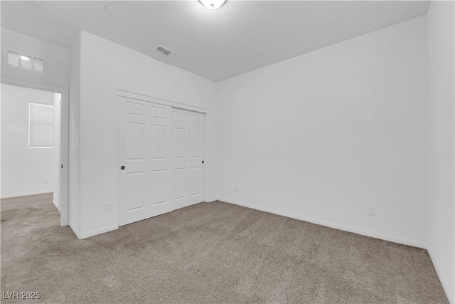 5677 Asyma Ct, Las Vegas, NV 89113 - unfurnished bedroom featuring carpet floors and a closet