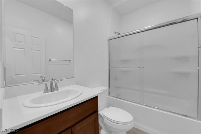 5677 Asyma Ct, Las Vegas, NV 89113 - bathroom featuring vanity and combined bath / shower with glass door