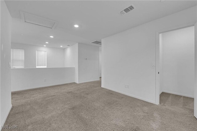 5677 Asyma Ct, Las Vegas, NV 89113 - carpeted spare room with recessed lighting and attic access