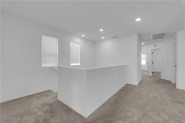 5677 Asyma Ct, Las Vegas, NV 89113 - hallway featuring an upstairs landing, carpet floors, and recessed lighting