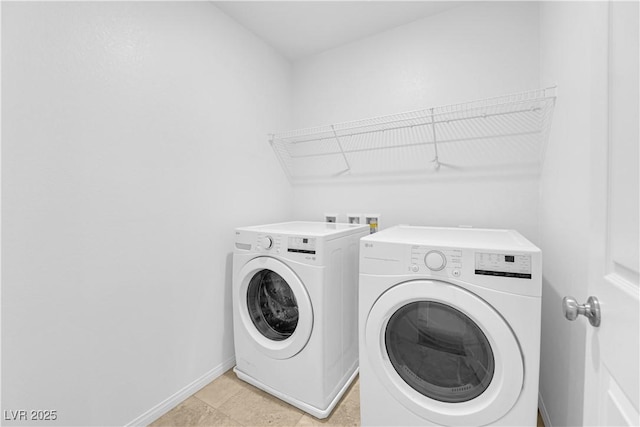 5677 Asyma Ct, Las Vegas, NV 89113 - washroom with washing machine and clothes dryer and baseboards