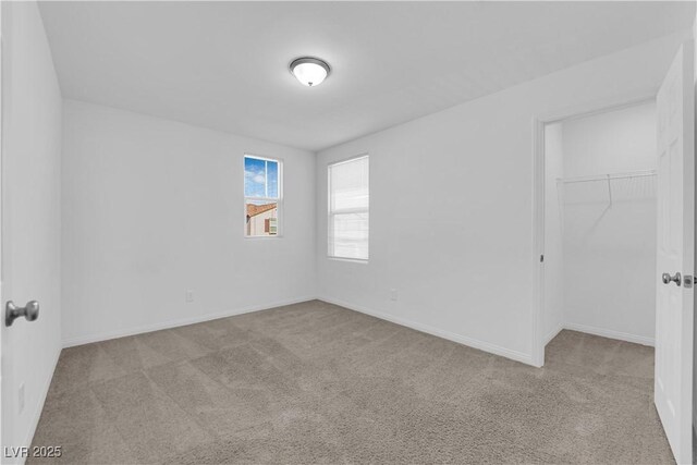 5677 Asyma Ct, Las Vegas, NV 89113 - carpeted empty room featuring baseboards