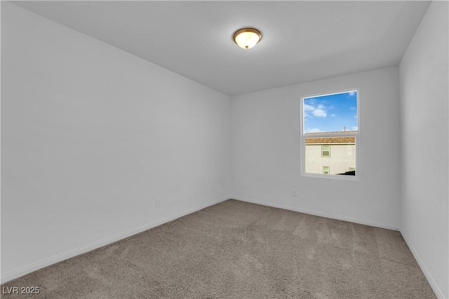 5677 Asyma Ct, Las Vegas, NV 89113 - carpeted spare room with baseboards