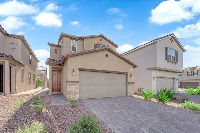 5677 Asyma Ct, Las Vegas, NV 89113 - mediterranean / spanish home featuring stucco siding, a tile roof, stone siding, and decorative driveway