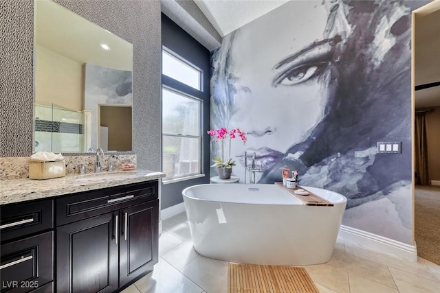 7311 Chaparral Cove Ln, Las Vegas, NV 89131 - full bathroom with vanity, a freestanding bath, a stall shower, and tile patterned floors
