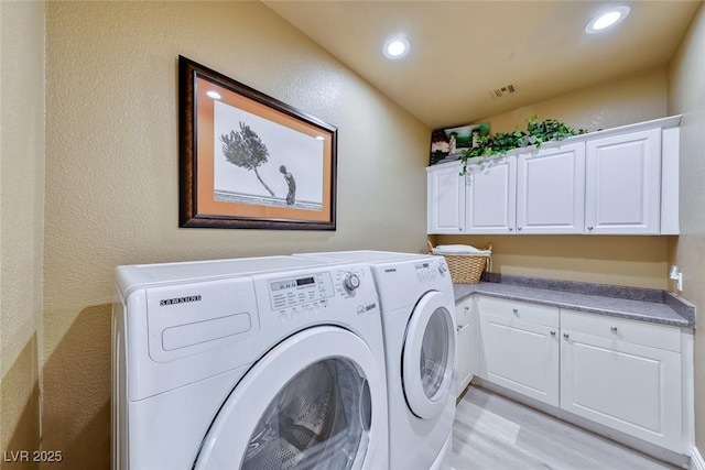 7311 Chaparral Cove Ln, Las Vegas, NV 89131 - laundry room featuring separate washer and dryer, cabinet space, recessed lighting, and light wood finished floors