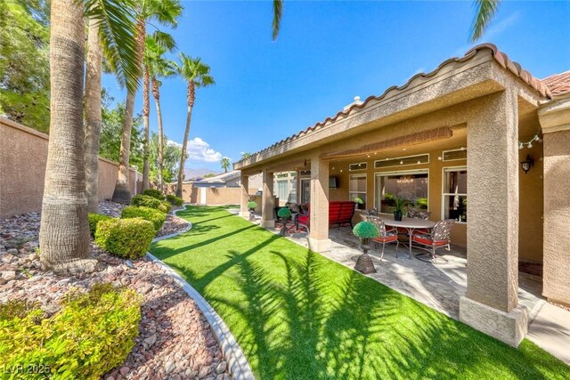 7311 Chaparral Cove Ln, Las Vegas, NV 89131 - fenced backyard featuring a patio