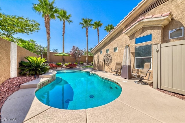 7311 Chaparral Cove Ln, Las Vegas, NV 89131 - view of pool featuring a fenced backyard and a patio area